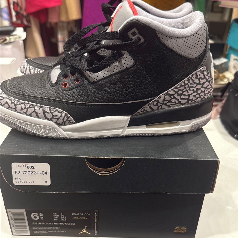 Jordan Sneakers with Black, Gray, and Red Soles